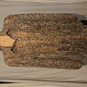 Chico's blouse, size 1.  Snake skin pattern, sheer fringed front